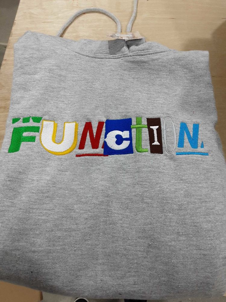 Grey hoodie with colourful FUNCTION lettering