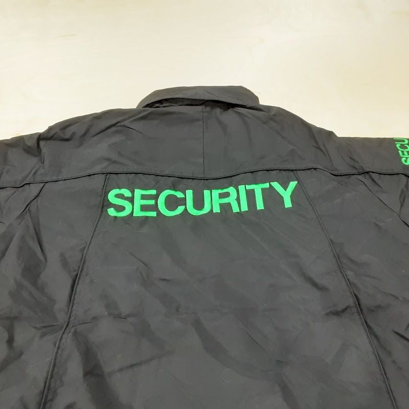 Grey jacket with green SECURITY lettering