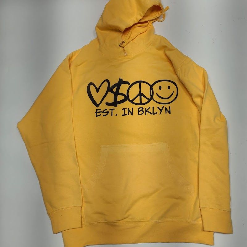 Yellow hoodie with a black printed Vibe Est. in Bklyn design